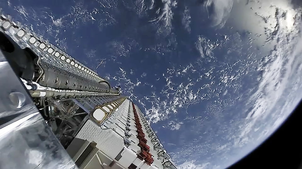 Starlink satellites orbiting Earth prior to deployment.